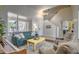 Bright living room featuring neutral walls, a piano and comfortable seating at 1697 E Linda Ln, Gilbert, AZ 85234