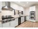 Clean kitchen featuring stainless steel appliances, quartz countertops, and subway tile backsplash at 1801 E Berridge Ln, Phoenix, AZ 85016