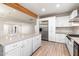 Modern kitchen featuring a center island, stainless steel appliances, and ample cabinet space at 1801 E Berridge Ln, Phoenix, AZ 85016