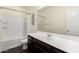 Bathroom with vanity, sink, and shower-tub combination at 19847 W Monroe St, Buckeye, AZ 85326