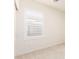 Bedroom featuring large window letting in natural light at 19847 W Monroe St, Buckeye, AZ 85326