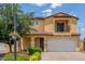 Front exterior view showcasing covered front porch and balcony on a sunny day at 2046 E Paradise Ln, Phoenix, AZ 85022
