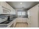 Functional kitchen offers white cabinets, modern appliances, and plenty of counter space at 205 N 74Th St # 227, Mesa, AZ 85207