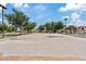 Community basketball court with surrounding greenery and homes, offering a space for active recreation at 2286 E Mohave Ln, Apache Junction, AZ 85119