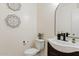 Half bathroom featuring modern decor, contemporary fixtures, and updated lighting at 2286 E Mohave Ln, Apache Junction, AZ 85119