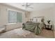 Comfortable bedroom with a cozy bed, ample natural light, and neutral tones at 2286 E Mohave Ln, Apache Junction, AZ 85119