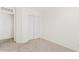 Cozy bedroom with a closet, neutral carpet, and white walls, providing a blank canvas for customization at 2286 E Mohave Ln, Apache Junction, AZ 85119