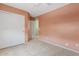 Comfortable bedroom with closet space and a ceiling fan, offering practical storage and climate control at 2286 E Mohave Ln, Apache Junction, AZ 85119