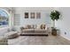 Bright living room with a large window and stylish neutral decor at 2286 E Mohave Ln, Apache Junction, AZ 85119