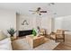 Comfortable living room with hardwood floors, modern decor, and plenty of space at 2286 E Mohave Ln, Apache Junction, AZ 85119