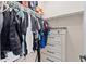 Walk-in closet with clothing racks and a dresser for ample storage at 23010 E Pummelos Rd, Queen Creek, AZ 85142