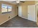Bedroom with a closet, window, neutral paint and carpet at 24811 W Wayland Dr, Buckeye, AZ 85326