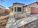 Attractive single-story home with desert landscaping, neutral paint, and two-car garage at 24811 W Wayland Dr, Buckeye, AZ 85326