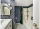 Cozy bathroom with a tub/shower combination and a vanity with ample storage at 2575 E Coronita Cir, Chandler, AZ 85225