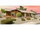 Charming single-story home with desert landscaping and mature trees under a pink sky at 2575 E Coronita Cir, Chandler, AZ 85225