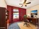 Functional home office with a large window, desk, and ample storage space at 2575 E Coronita Cir, Chandler, AZ 85225