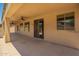 Covered patio with ceiling fans, desert landscaping and a view of the backyard at 26080 N 73Rd Ln, Peoria, AZ 85383
