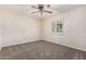 Neutral bedroom featuring plush carpeting and window with white shutter at 2807 N 8Th Ave, Phoenix, AZ 85007