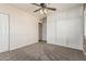 Bedroom with neutral walls and carpeting features closet, fan with light, and storage at 2807 N 8Th Ave, Phoenix, AZ 85007