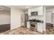 Modern kitchen featuring stainless steel refrigerator and gas range stove at 2807 N 8Th Ave, Phoenix, AZ 85007