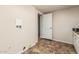 Bright laundry area with tiled flooring, utility sink and washer/dryer hookups ready for appliances at 2807 N 8Th Ave, Phoenix, AZ 85007