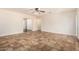 Spacious living room with tile flooring and ceiling fan, perfect for entertaining and relaxation at 2807 N 8Th Ave, Phoenix, AZ 85007