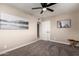 Bedroom with neutral decor, soft carpeting, and ceiling fan at 3012 W Butler Dr, Phoenix, AZ 85051