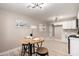 Bright dining area featuring a round table, stylish seating, and neutral decor at 3012 W Butler Dr, Phoenix, AZ 85051