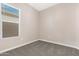 Bedroom featuring neutral walls, carpet floors, an outlet, and a window with blinds at 40816 W Sunland Dr, Maricopa, AZ 85138