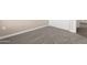 Bedroom featuring neutral walls, carpet floors, an outlet, and a white door at 40816 W Sunland Dr, Maricopa, AZ 85138