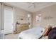 Bedroom featuring neutral decor and a sliding door access to a private patio at 4241 N Pebblecreek Pkwy # 7, Goodyear, AZ 85395