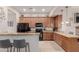 Bright kitchen featuring granite countertops, tile flooring, and stainless steel appliances at 4241 N Pebblecreek Pkwy # 7, Goodyear, AZ 85395