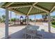 Community playground with picnic table and play equipment, perfect for families and outdoor fun at 4241 N Pebblecreek Pkwy # 7, Goodyear, AZ 85395