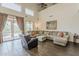 Bright living room with high ceilings, large windows, and direct access to the outdoor pool area at 4293 S Columbine Way, Gold Canyon, AZ 85118