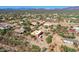 Desert landscape homes feature ample parking and landscaping, set against a backdrop of mountains and blue skies at 44421 N 12Th St, New River, AZ 85087