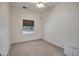 Spare bedroom with carpeted floors and picturesque window views at 44421 N 12Th St, New River, AZ 85087