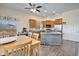 Inviting kitchen with stainless steel appliances, granite countertops, and a cozy breakfast nook at 44421 N 12Th St, New River, AZ 85087