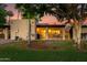 Landscaped backyard with desert landscaping, patio and mature shade trees at 446 S 77Th St, Mesa, AZ 85208