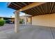 Covered carport offering ample parking space and protection from the elements at 446 S 77Th St, Mesa, AZ 85208