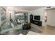 Bright living room with comfortable seating and sliding glass doors to the outside at 446 S 77Th St, Mesa, AZ 85208