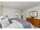 Comfortable bedroom with ample closet space and view to the adjacent kitchen and bath at 446 S 77Th St, Mesa, AZ 85208