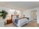 Comfortable bedroom with ample closet space and access to the bathroom at 446 S 77Th St, Mesa, AZ 85208