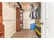 Walk-in closet with hanging racks and ample storage shelves at 45309 W Gavilan Dr, Maricopa, AZ 85139