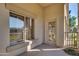 Covered patio featuring dual windows, a doorway, and serene views for relaxing and enjoying the outdoor space at 5350 E Deer Valley Dr # 1433, Phoenix, AZ 85054