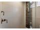 Modern shower featuring sleek tile work, glass doors, and updated fixtures at 6438 E Claire Dr, Scottsdale, AZ 85254