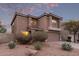 Charming two-story home featuring desert landscaping and a tile roof at 7500 E Deer Valley Rd # 157, Scottsdale, AZ 85255