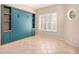 Bedroom with round window and shutters at 8874 W Piute Ave, Peoria, AZ 85382