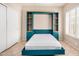 Bedroom with a murphy bed and large window at 8874 W Piute Ave, Peoria, AZ 85382