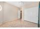 Empty bedroom with tile flooring and a double door closet at 8874 W Piute Ave, Peoria, AZ 85382