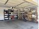 Organized garage space with ample shelving, offering great storage solutions for various items at 8927 W Paradise Dr, Peoria, AZ 85345